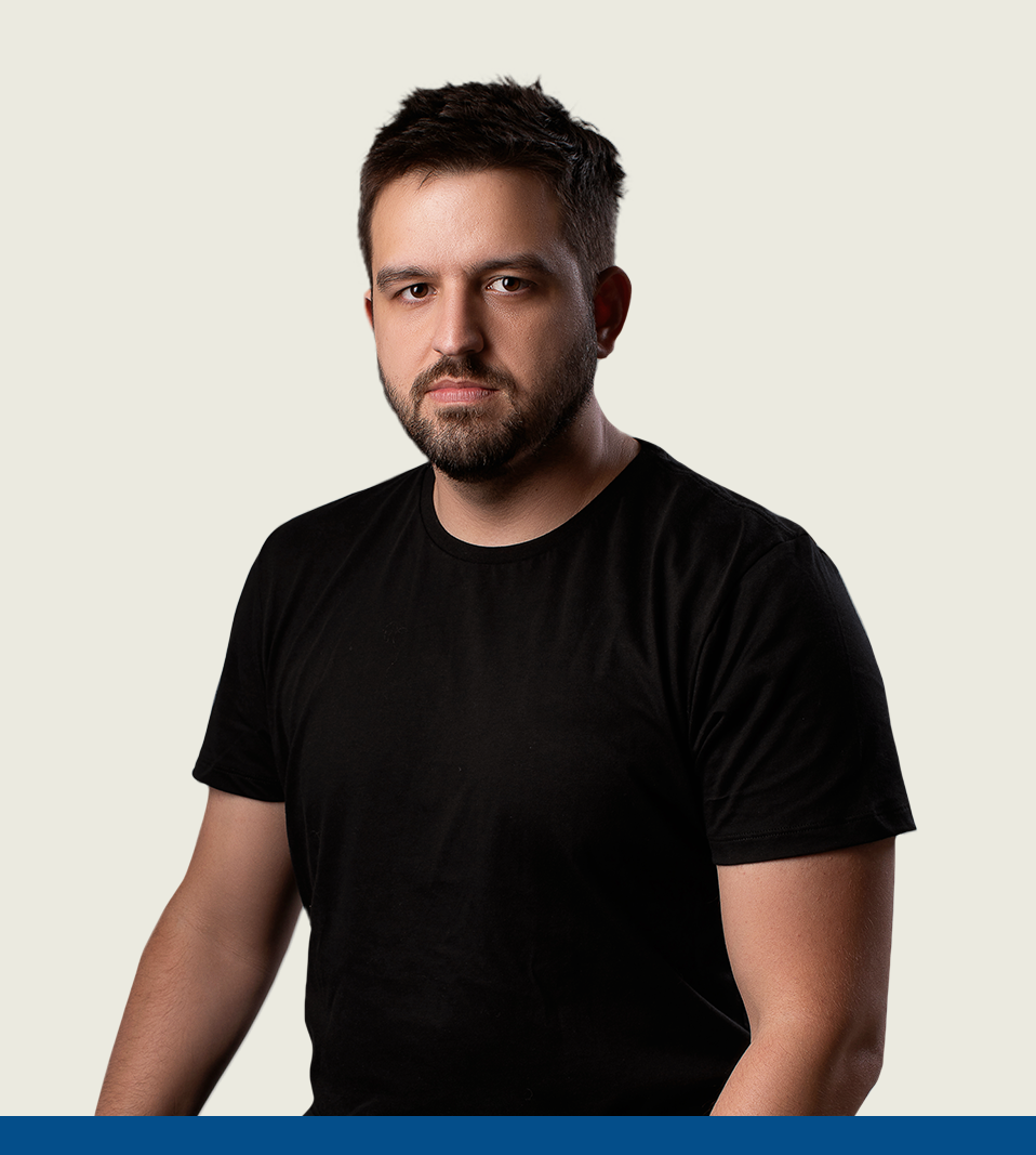 Stylized blue duotone portrait of a woman with long hair facing slightly backward